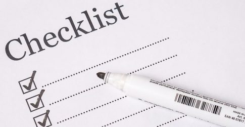 A checklist with a marker.