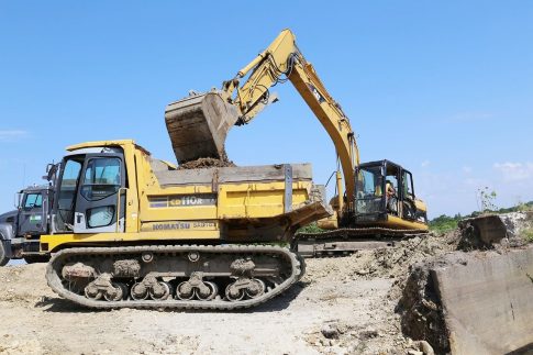 An excavator working on a construction site.